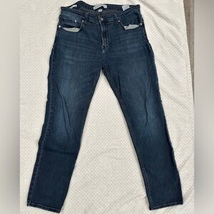 Never worn Calvin Klein blue jeans